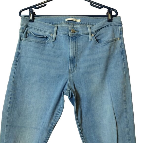 Levi’s Women's Size 33 Slimming Skinny Distressed Light Blue Mid-Rise Jeans - Picture 2 of 6